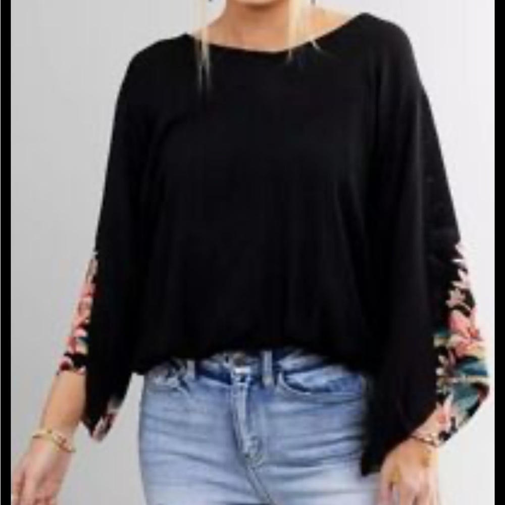 Billabong Black Top, back tie at neck, Floral design on long sleeves, size Lg